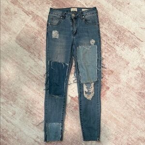 Distressed Blue Jeans